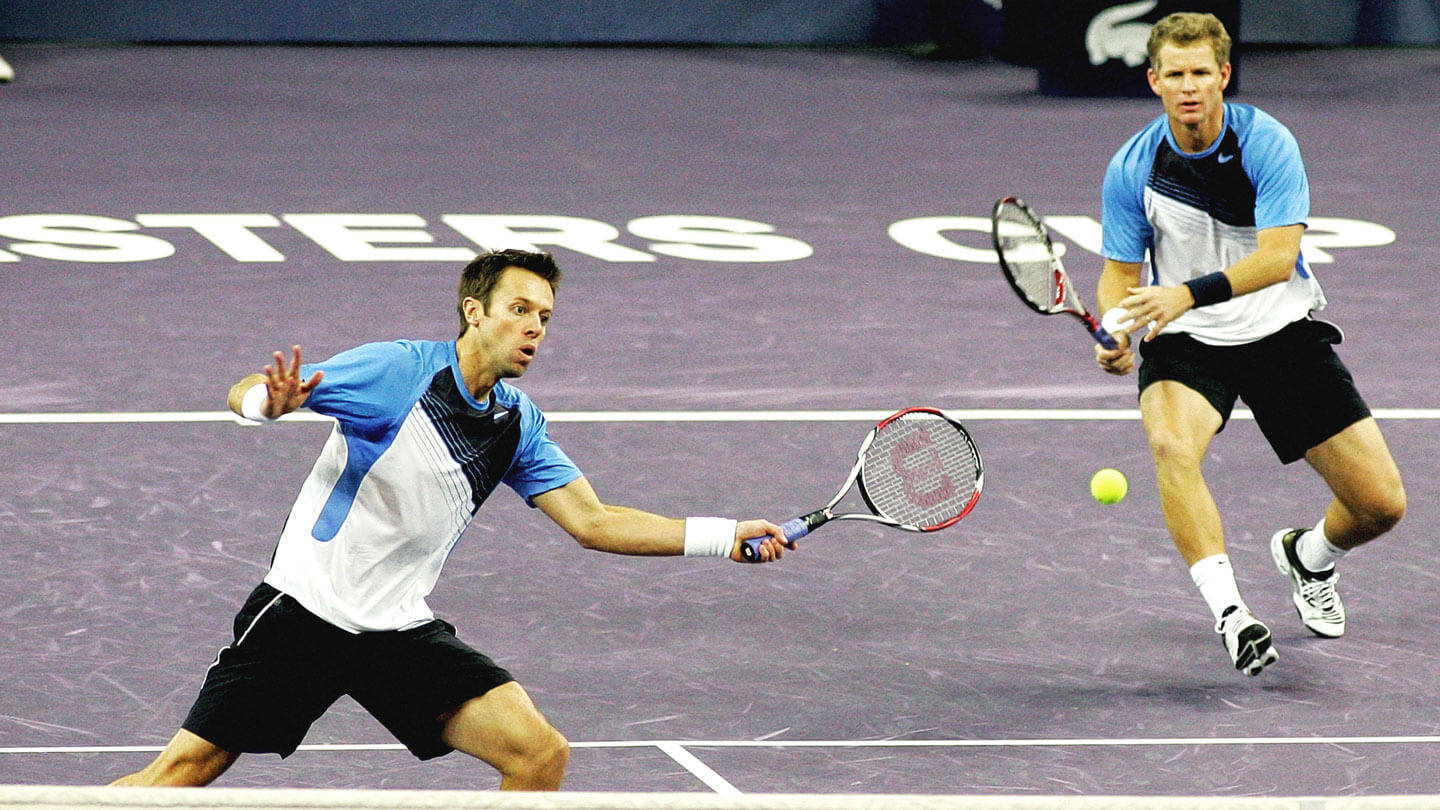 Daniel Nestor Running With Partner Wallpaper