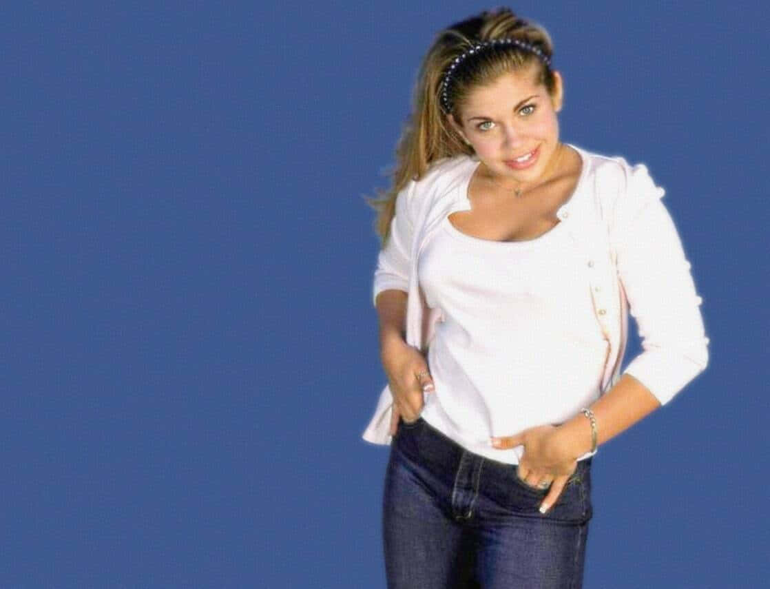 Danielle Fishel Posing At A Photoshoot Wallpaper