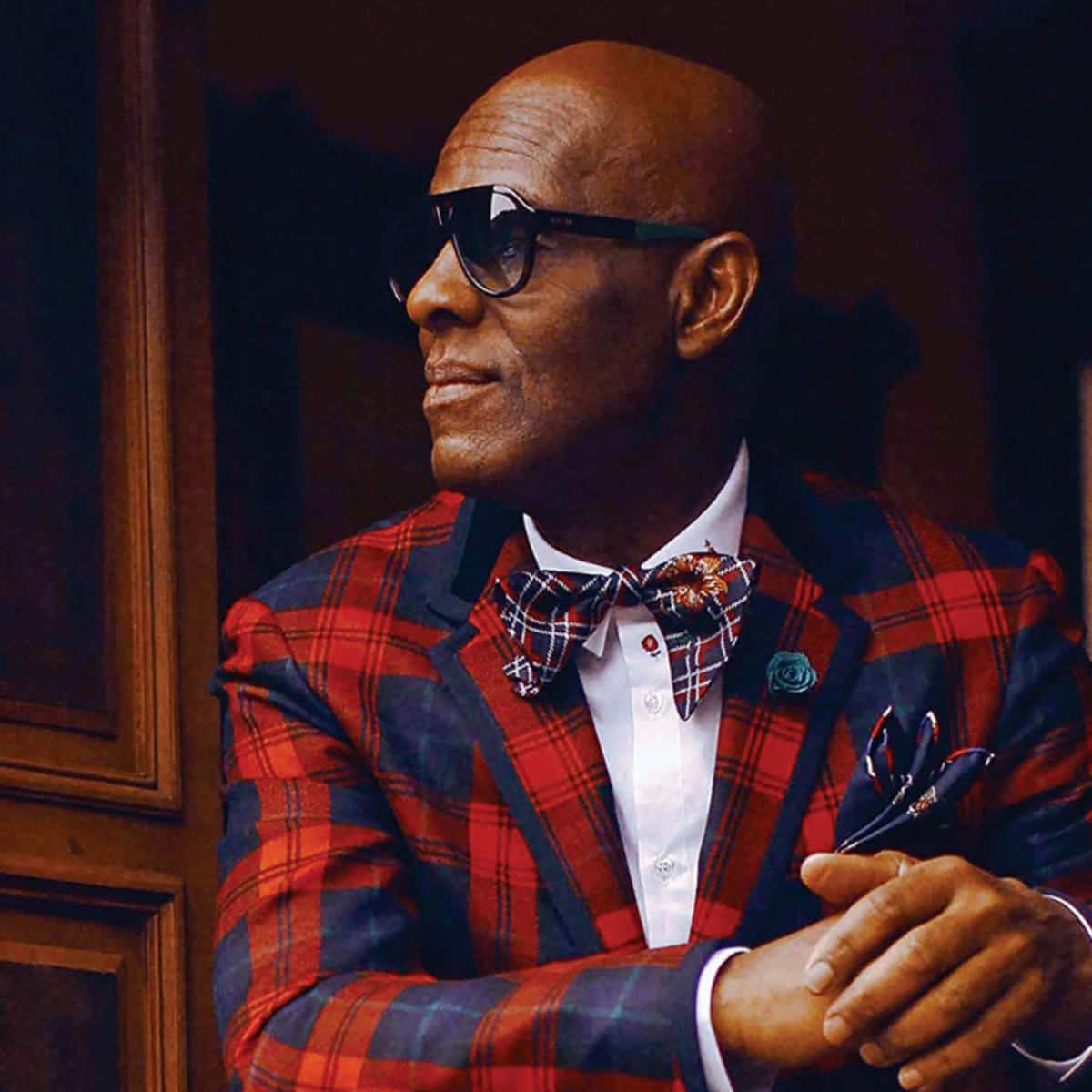 Dapper Dan Looking Sharp In Plaid Suit Wallpaper