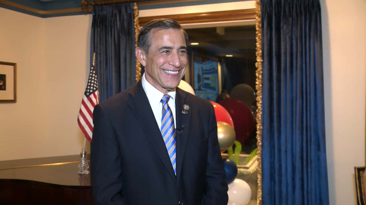 Darrell Issa In A Business Suit Giving A Speech Wallpaper