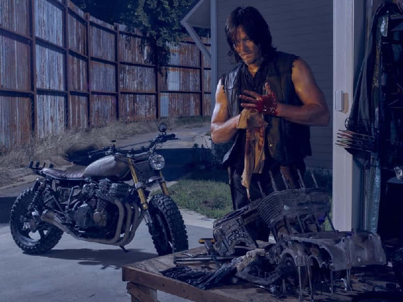 Daryl Dixon Motorcycle Maintenance Wallpaper