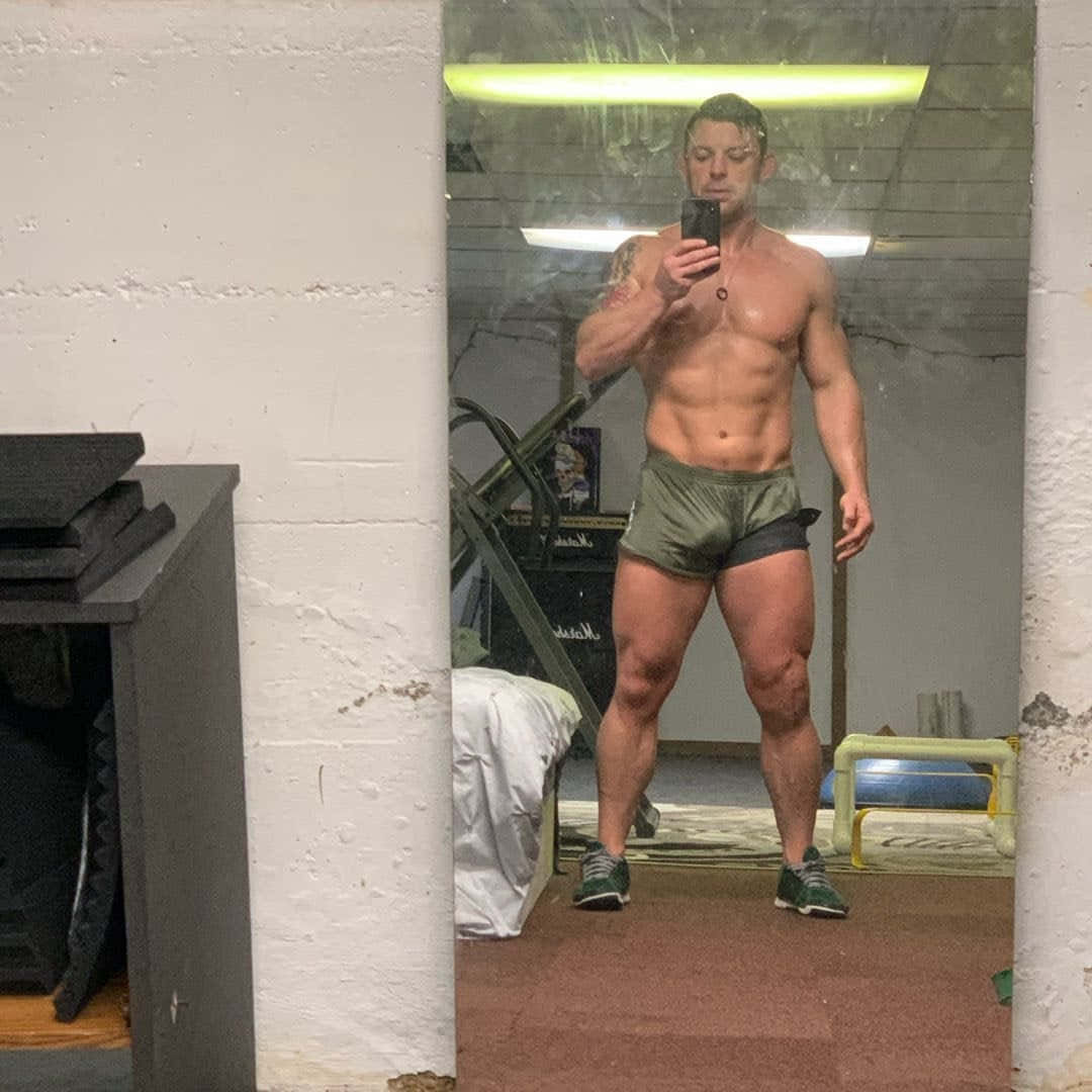 Davey Richards Showing Off Physique In Intense Workout Session Wallpaper