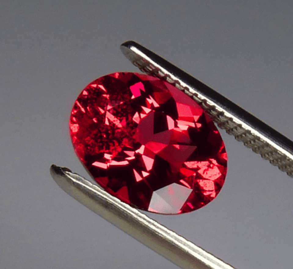 Dazzling Red Diamond On Black Background Wallpaper