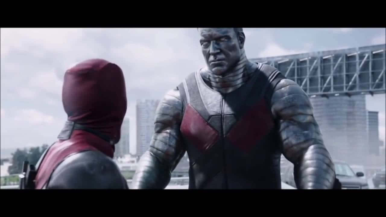 Deadpool And Colossus Unite In Epic Battle Scene Wallpaper