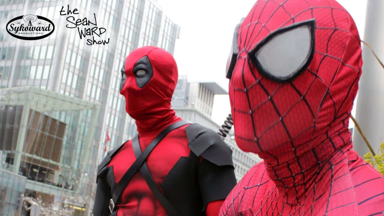 Deadpool And Spiderman Teaming Up In Action Wallpaper