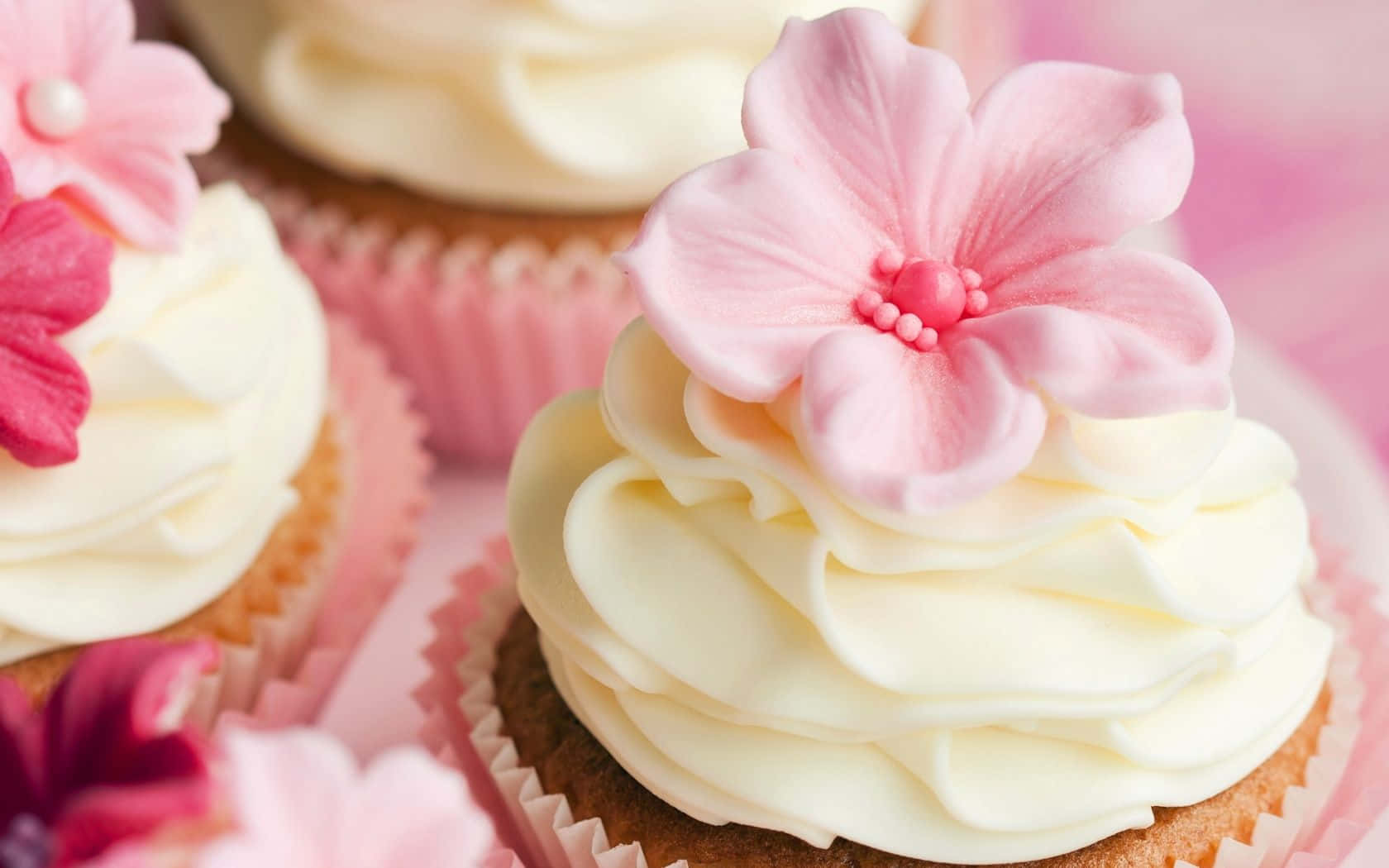 Delectable Pink Cupcakes On Display Wallpaper