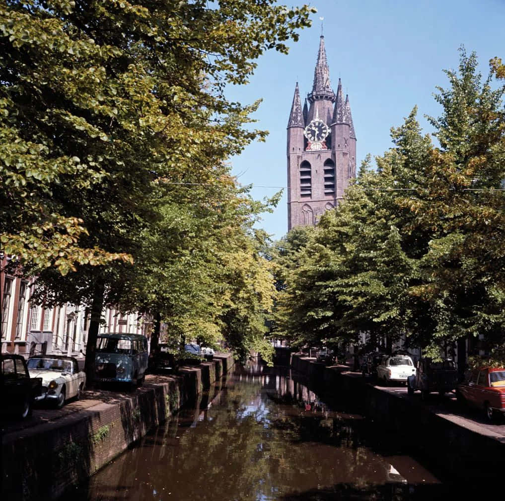 Delft Canal Viewwith Church Tower Wallpaper