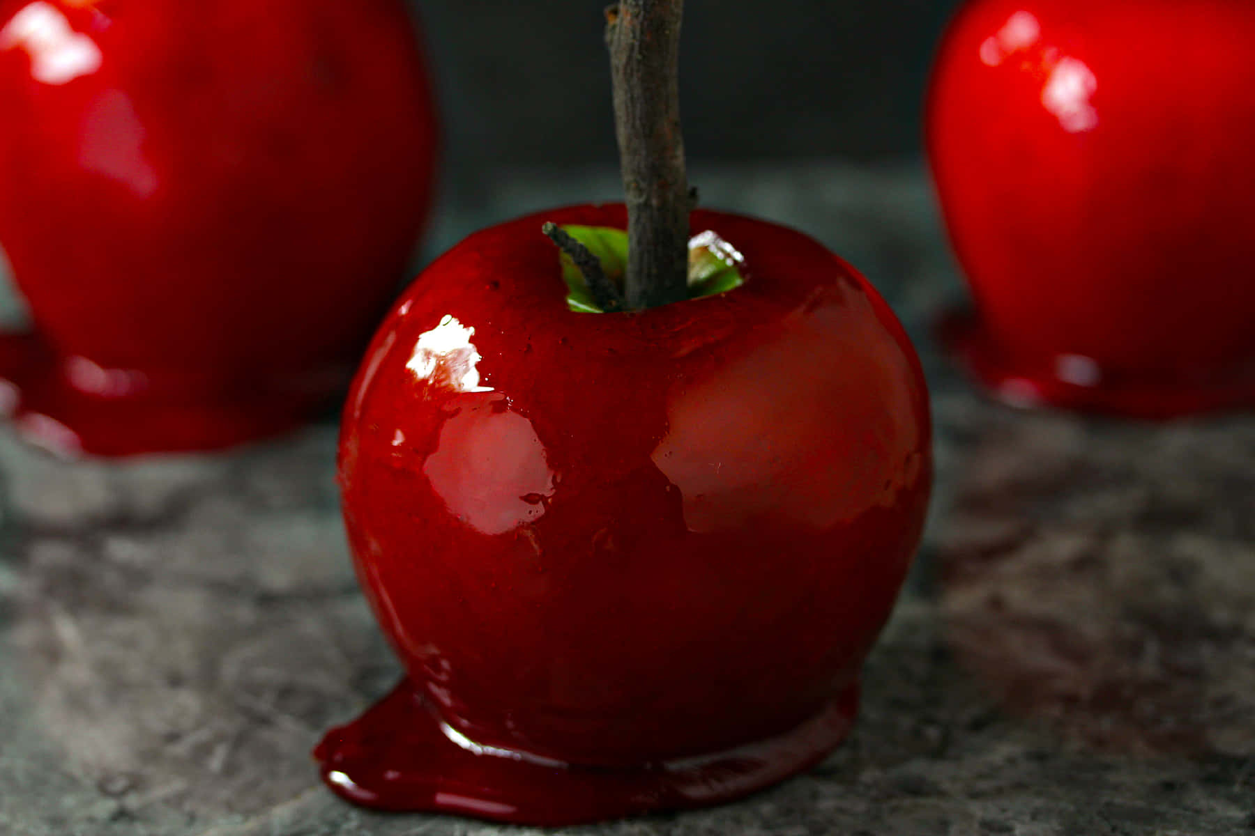 Delicious Candy Apples On Display Wallpaper