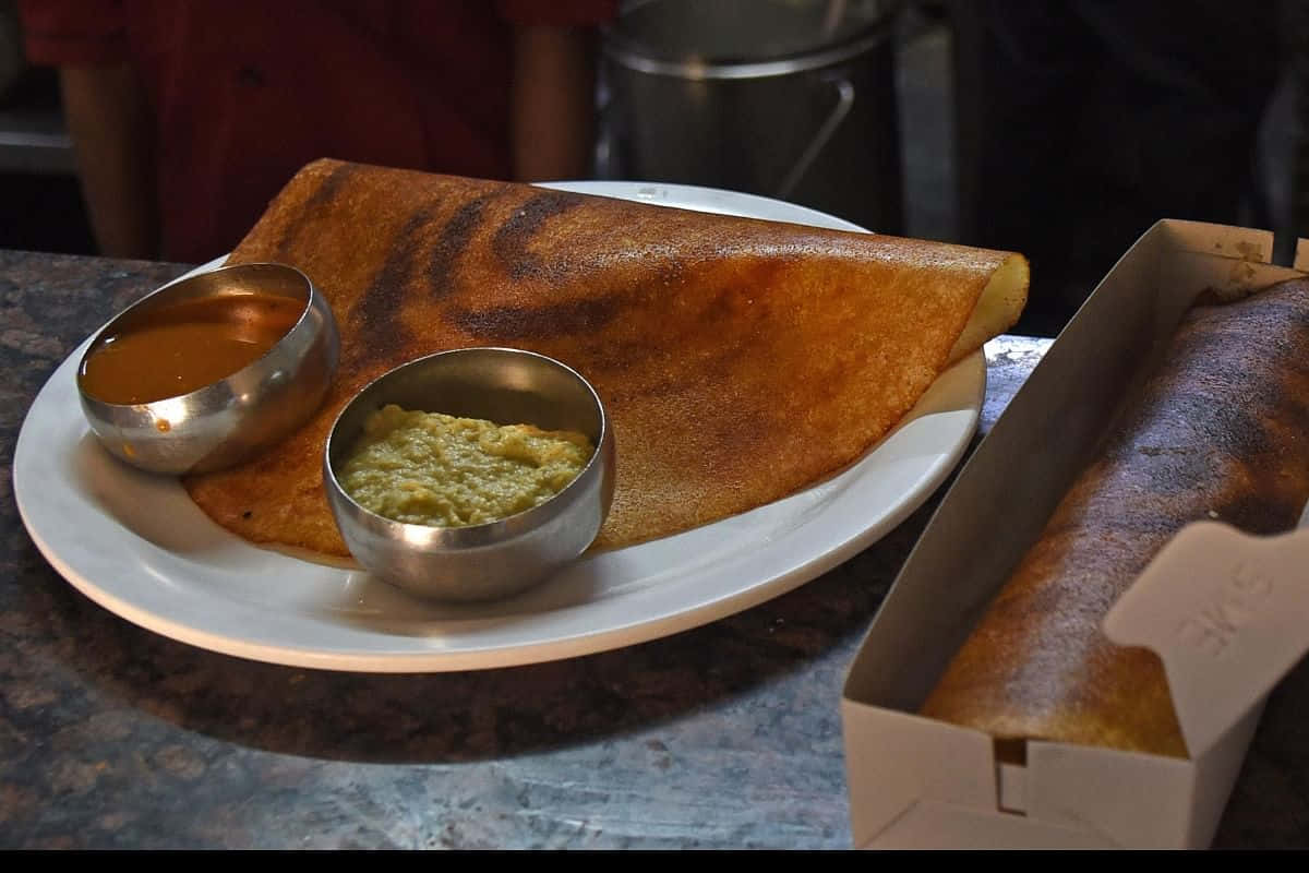 Delightful Indian Dosa Cuisine Wallpaper