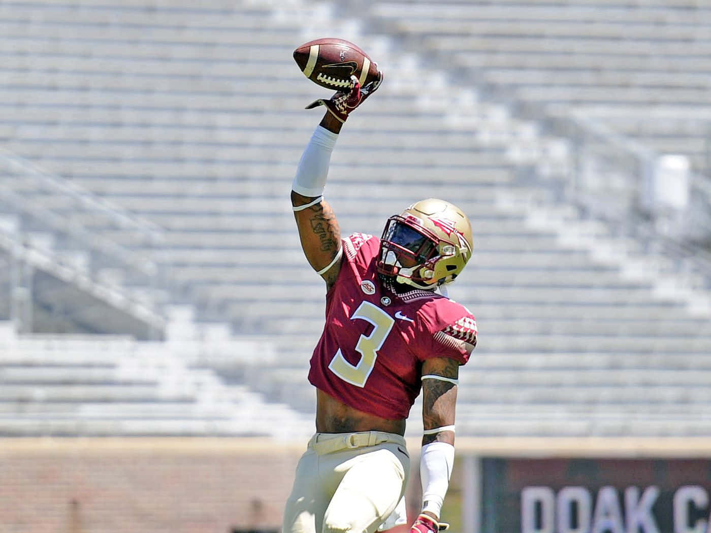 Derwin James Catching The Football Wallpaper