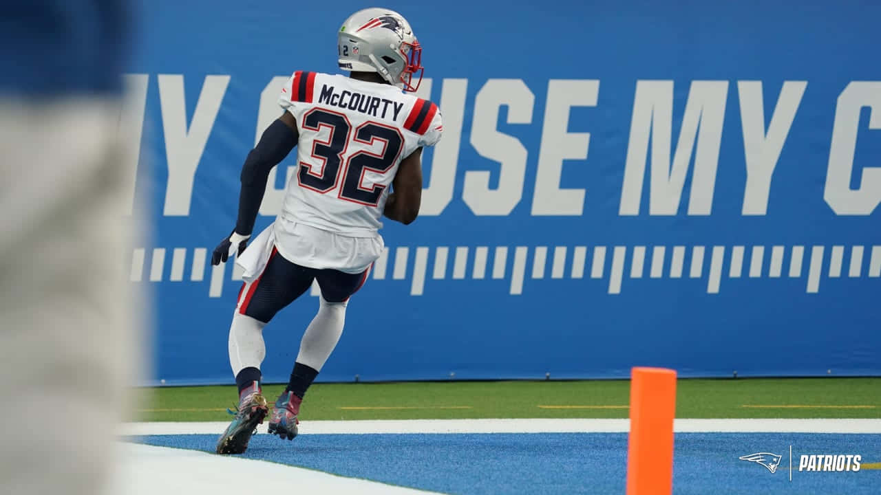 Devin Mccourty In Action On The Field Wallpaper