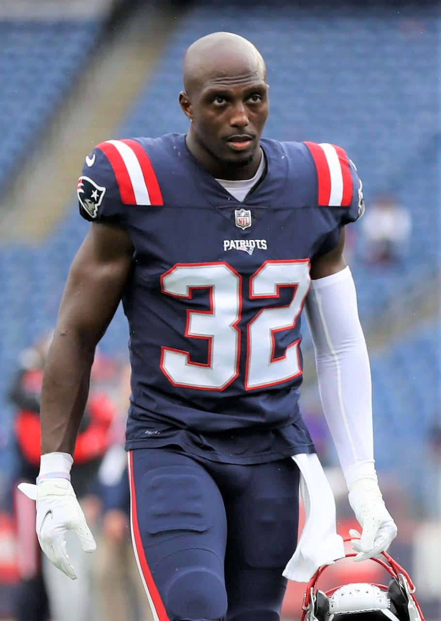 Devin Mccourty In Action On The Field Wallpaper