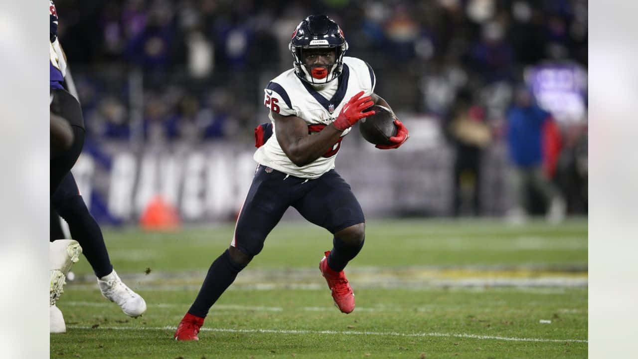 Devin Singletary In Action During Game Wallpaper