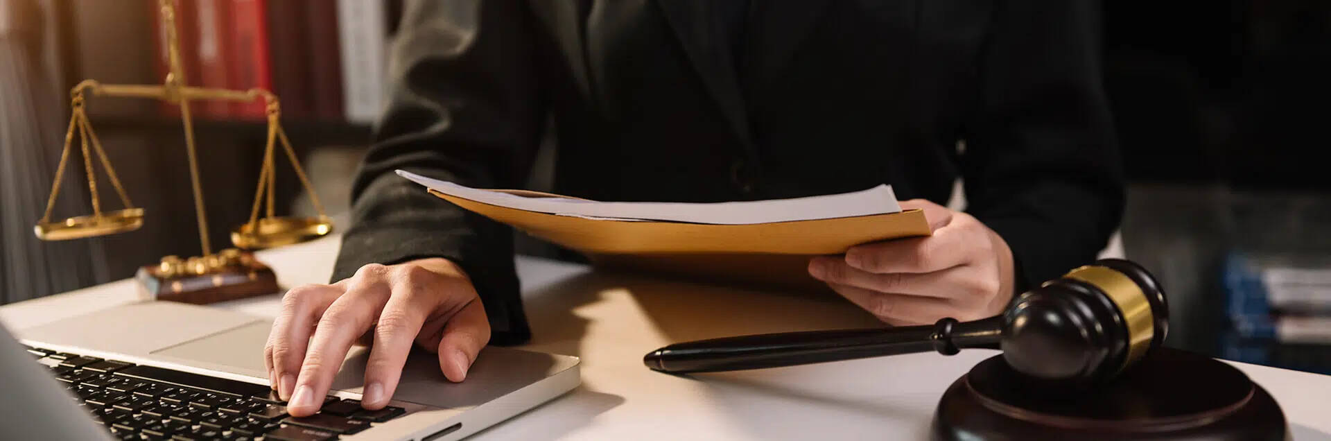 Diligent Lawyer Reviewing Case Documents Wallpaper