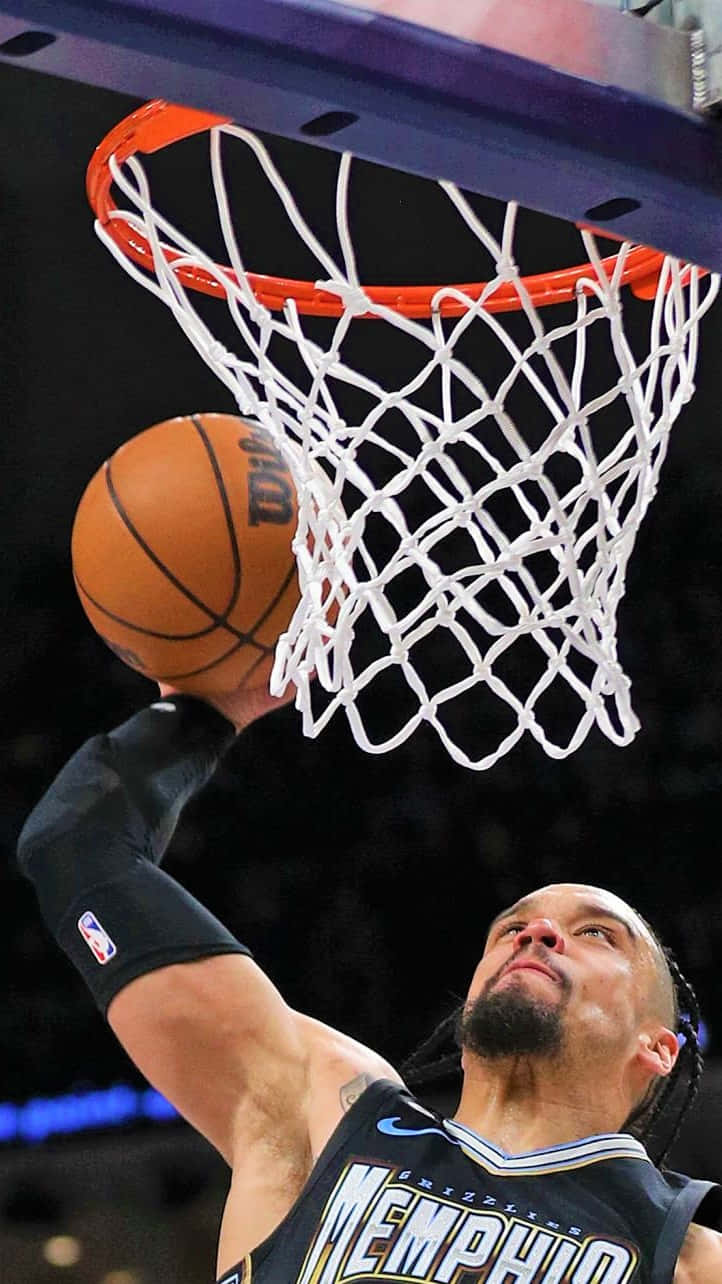 Dillon Brooks In Action On The Basketball Court Wallpaper