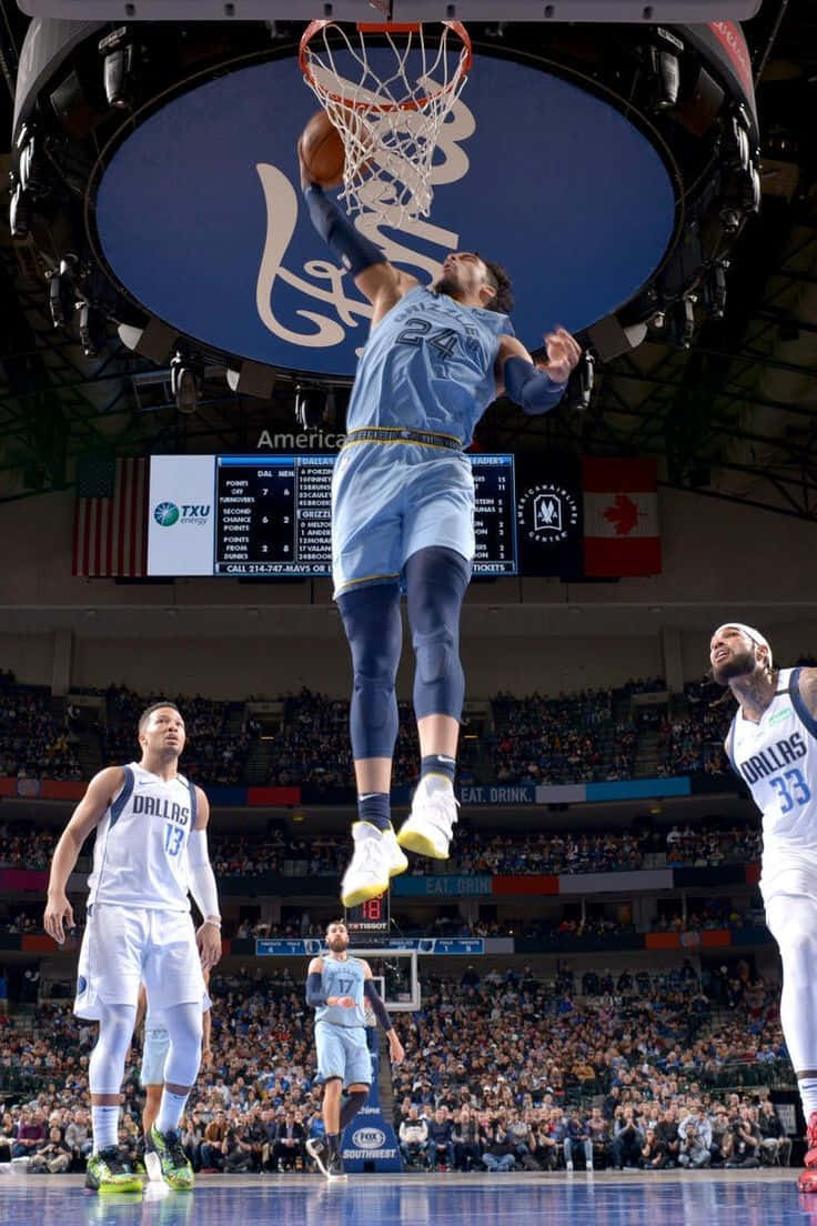 Dillon Brooks In Action On The Basketball Court Wallpaper