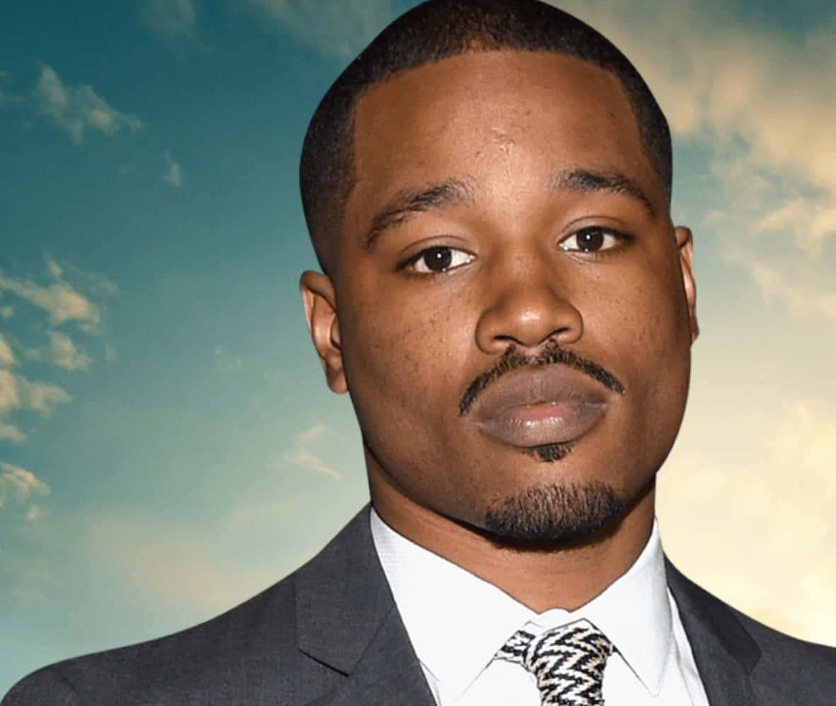 Director Ryan Coogler Posing For A Photo Wallpaper