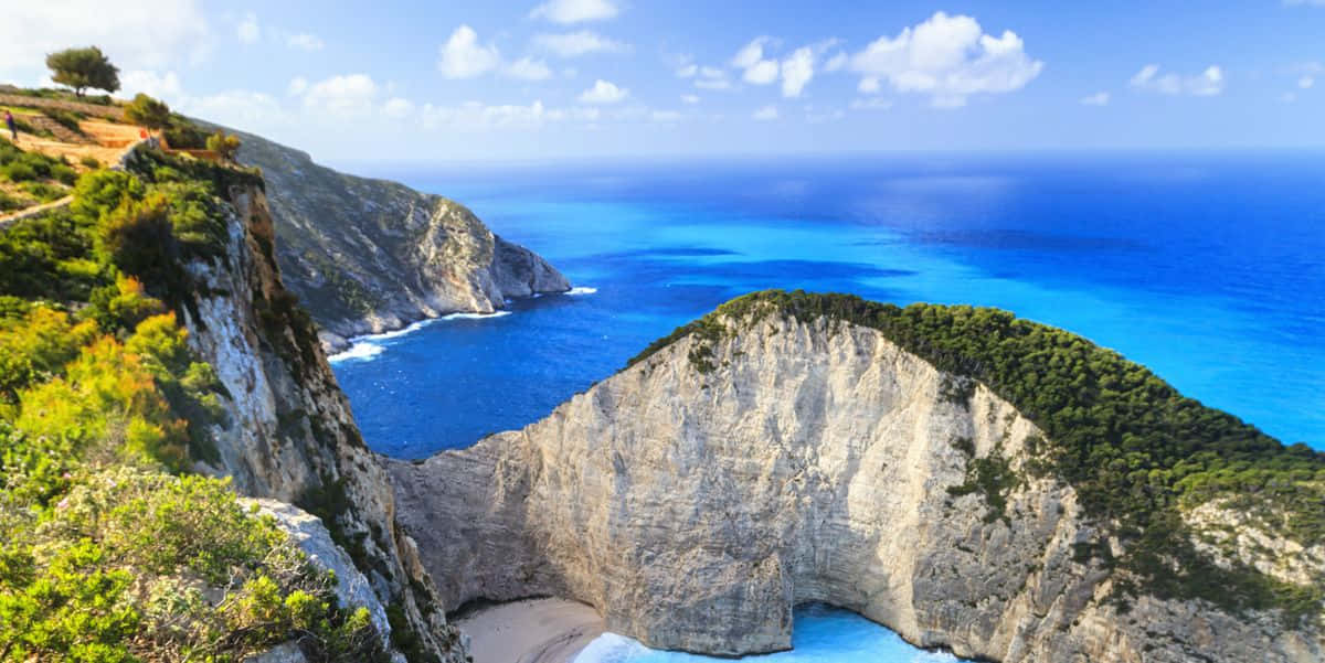 Discover The Serenity Of A Greek Island Wallpaper