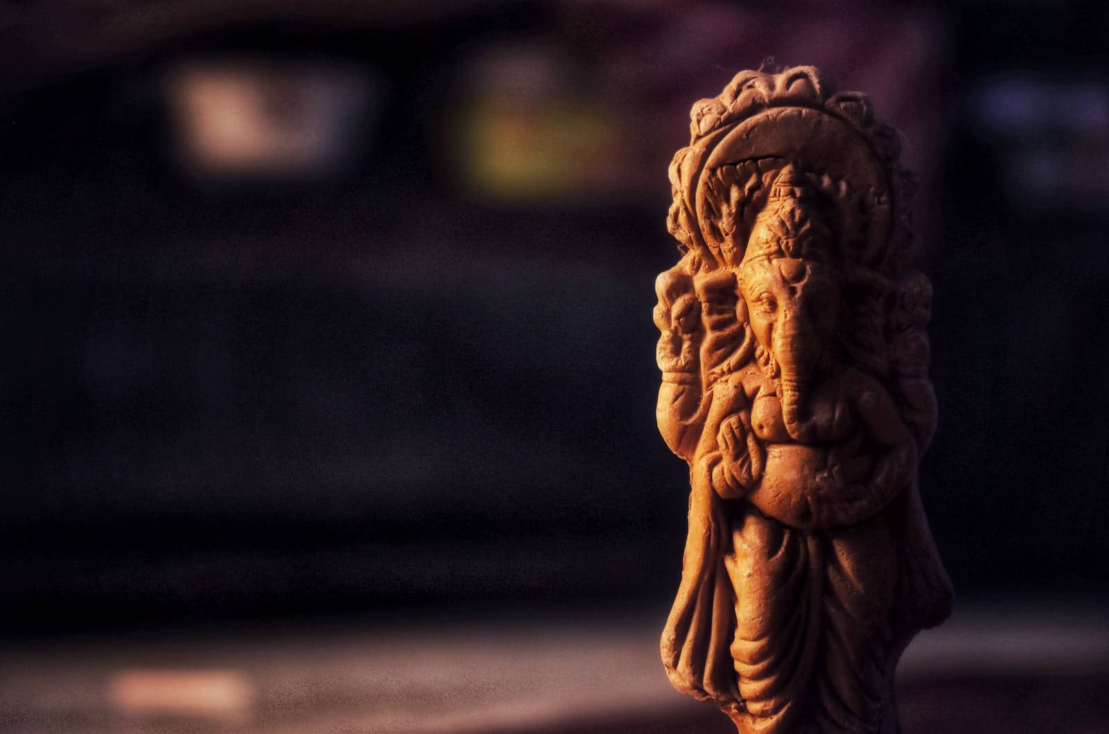 Divine Clay Sculpture Of God Ganesh Wallpaper