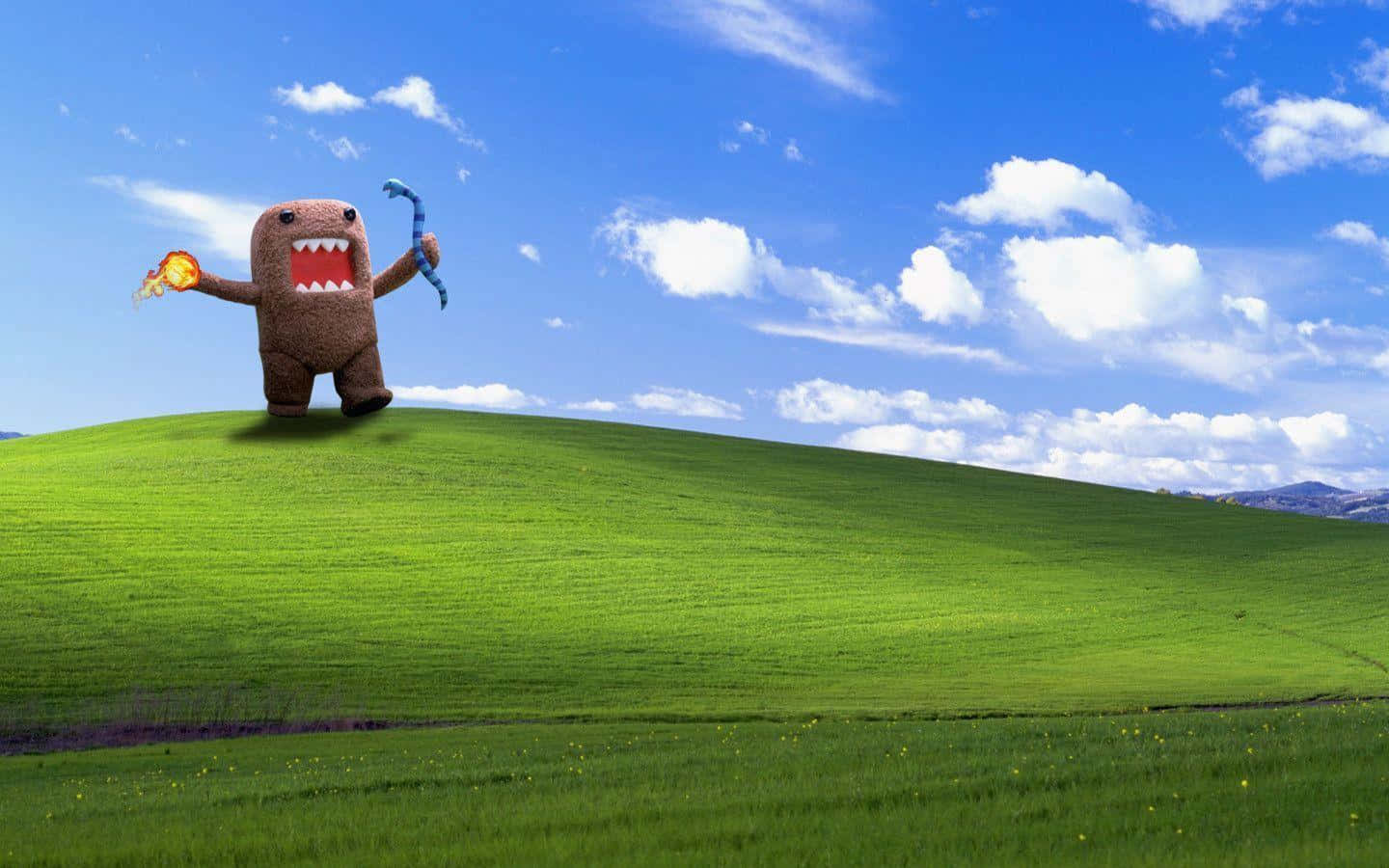 Domo_ Character_on_ Green_ Hillside Wallpaper