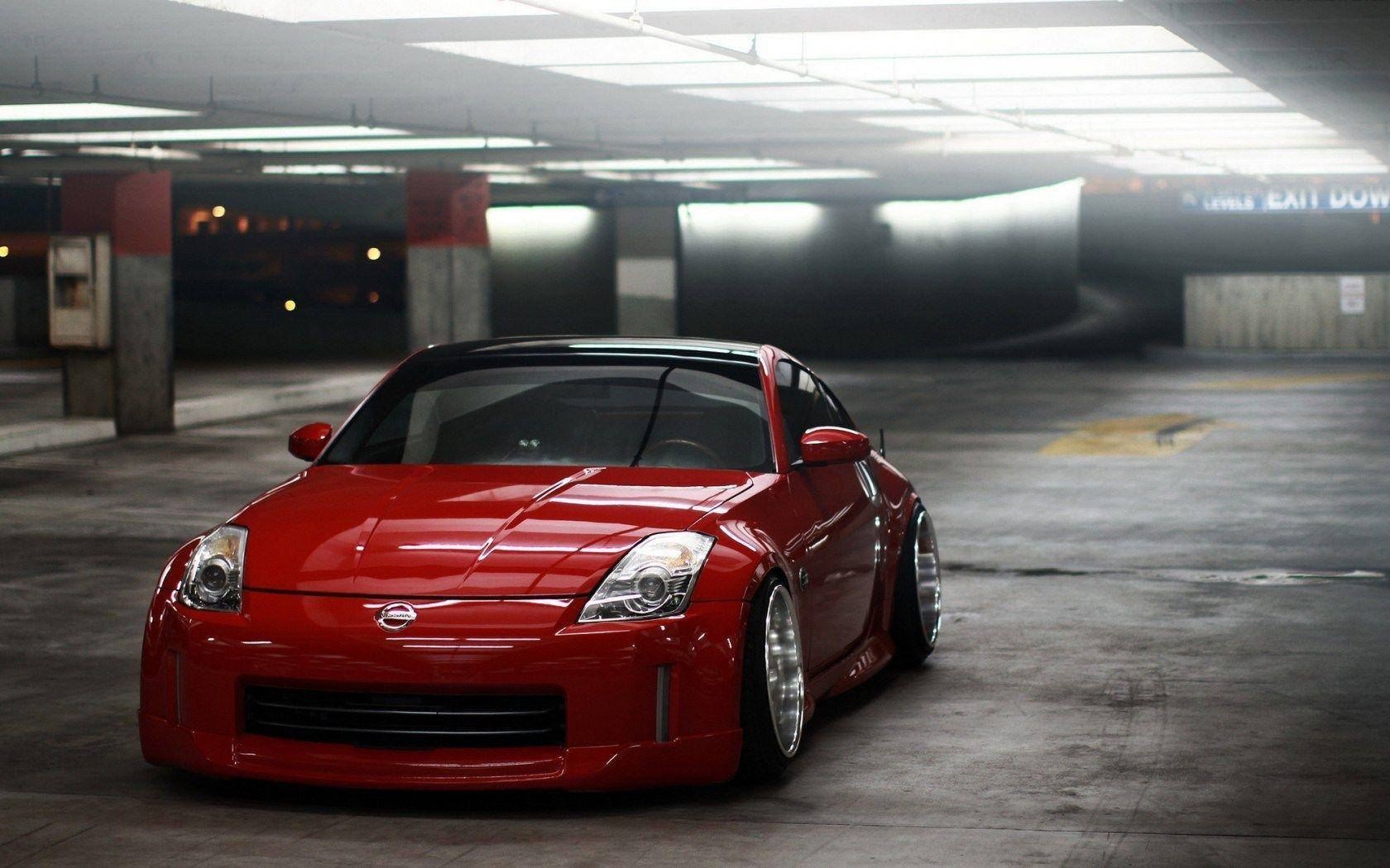 Driving A Nissan 350z -- The Speed Of Life Wallpaper