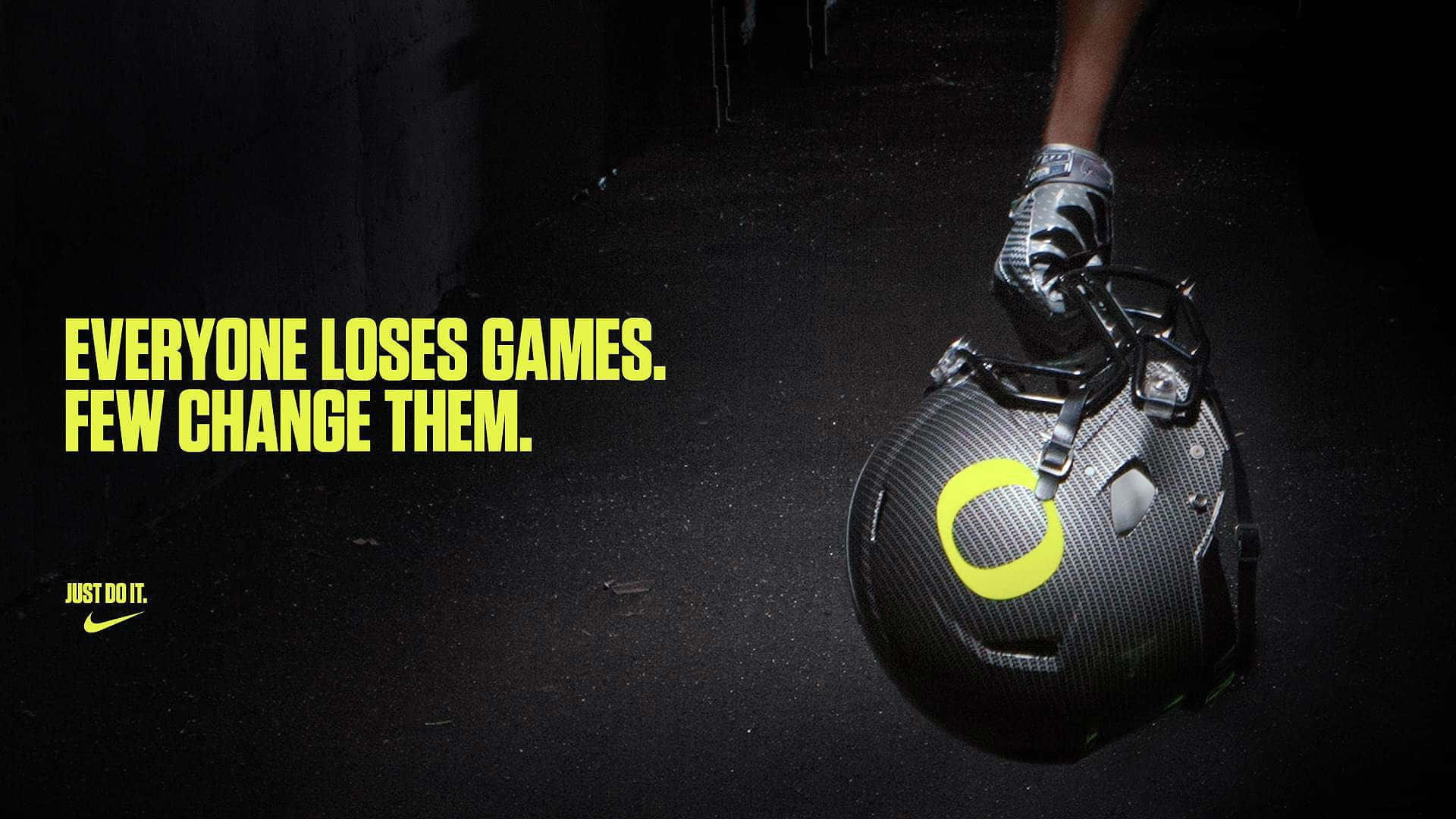 Ducks In Action: The Oregon Ducks Football Team In Mid-play During An Intense Game Wallpaper