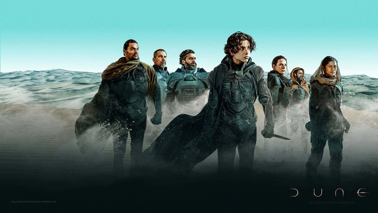 Dune Movie Cast Wading Through Sand Wallpaper