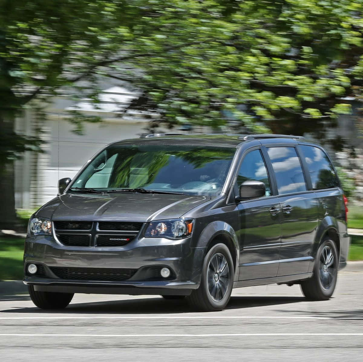 Dynamic Dodge Grand Caravan On The Move Wallpaper