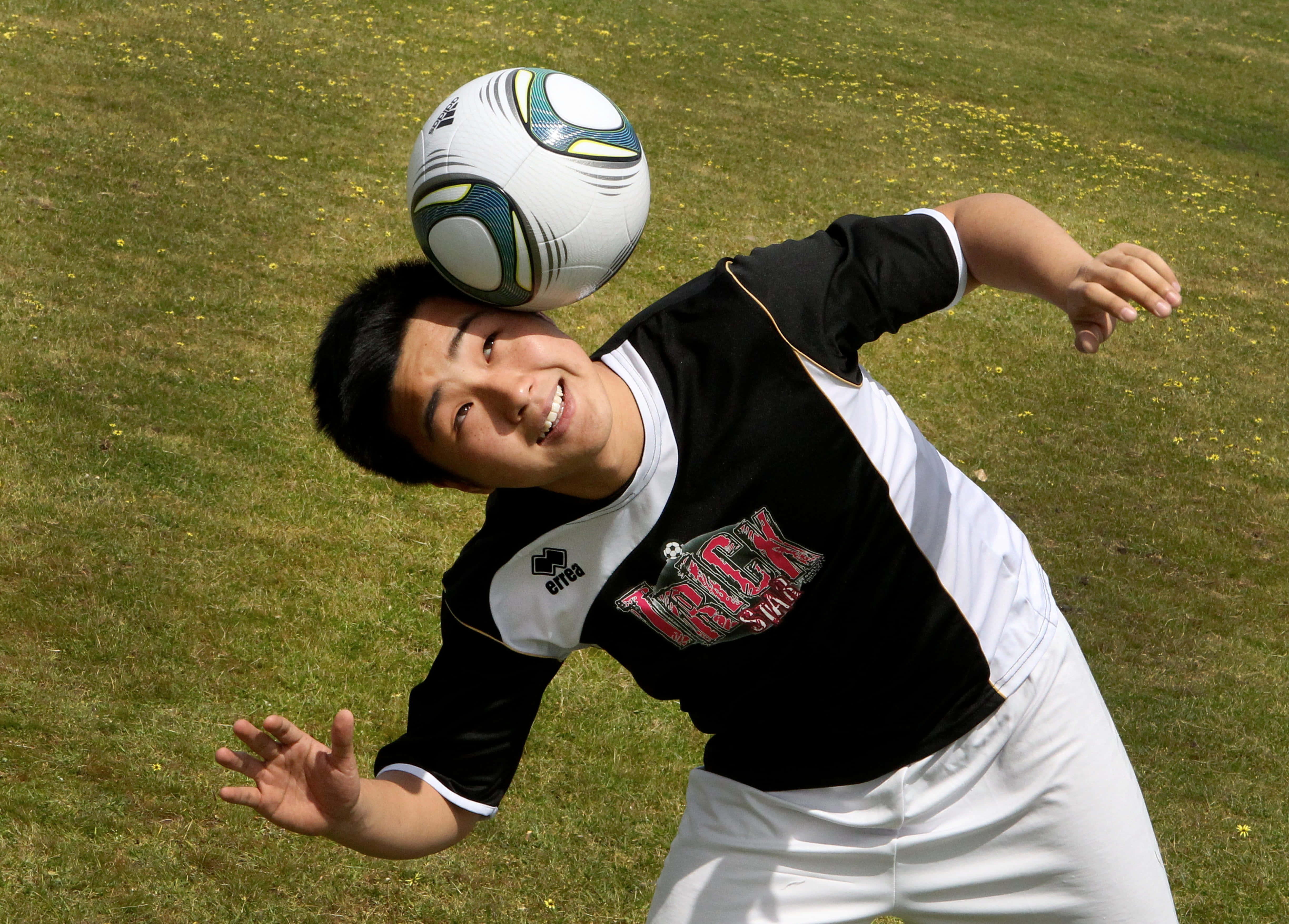 Dynamic Freestyle Soccer Tricks Wallpaper