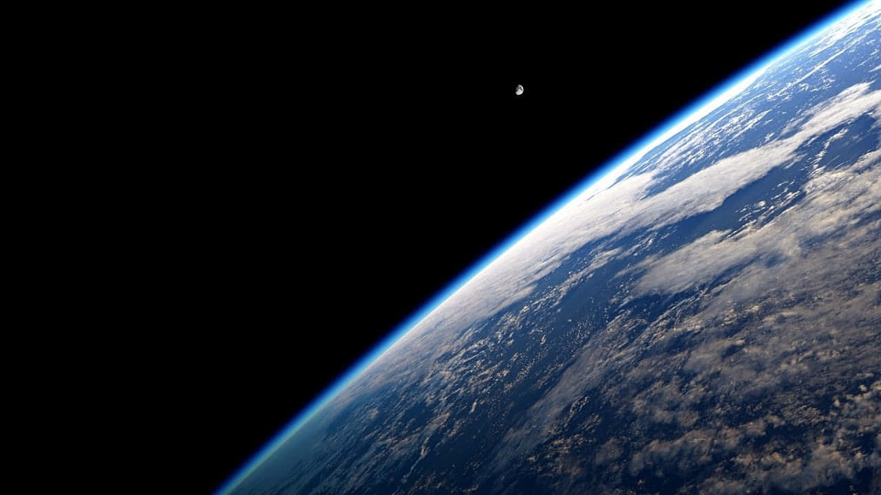 Earth_ Horizon_and_ Moon_ View_ From_ Space.jpg Wallpaper