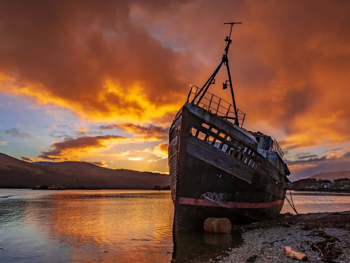 Eerie Elegance: A Sunken Ship's Tale Wallpaper