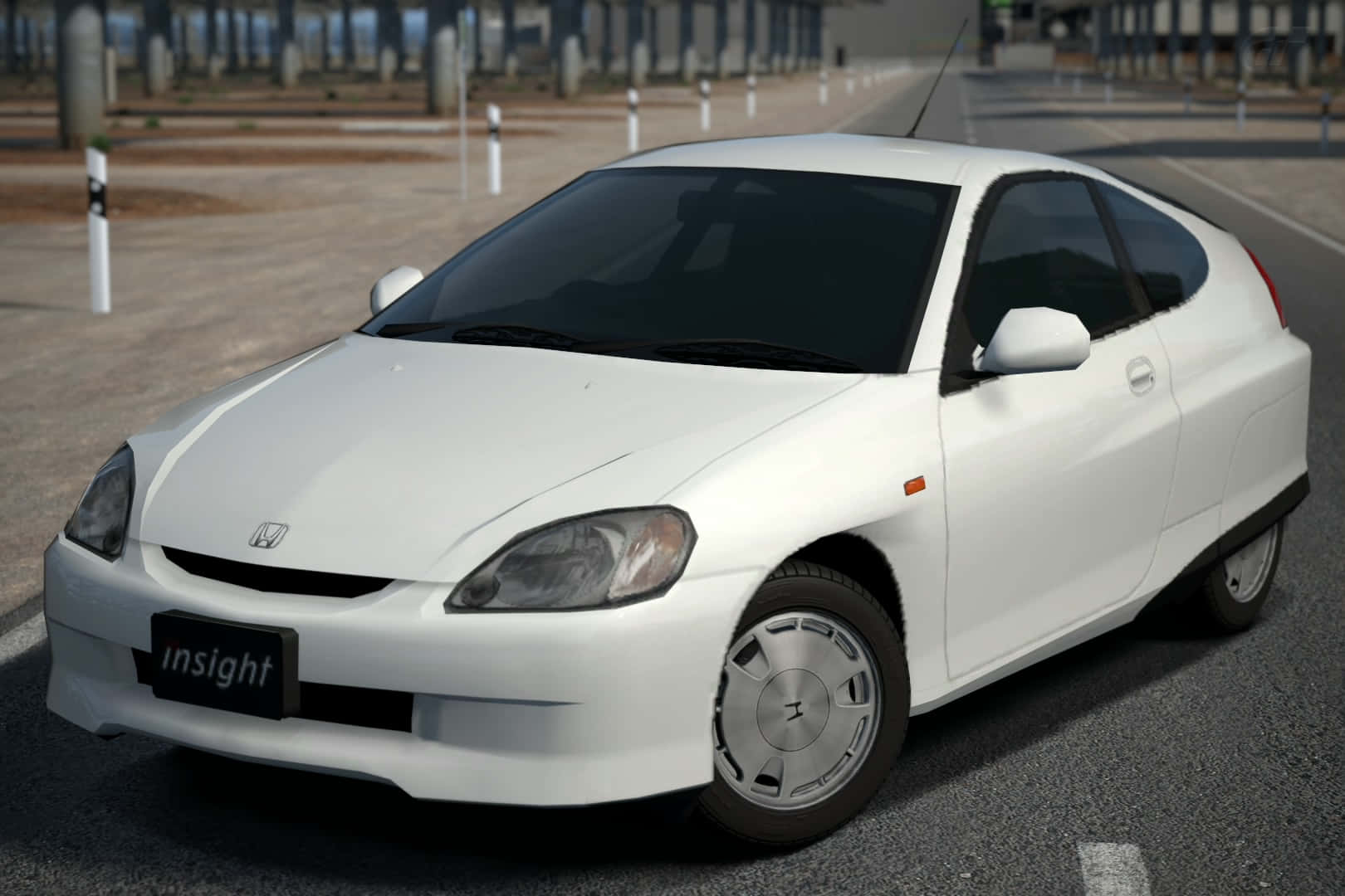 Efficient And Stylish Honda Insight Parked In Nature Wallpaper