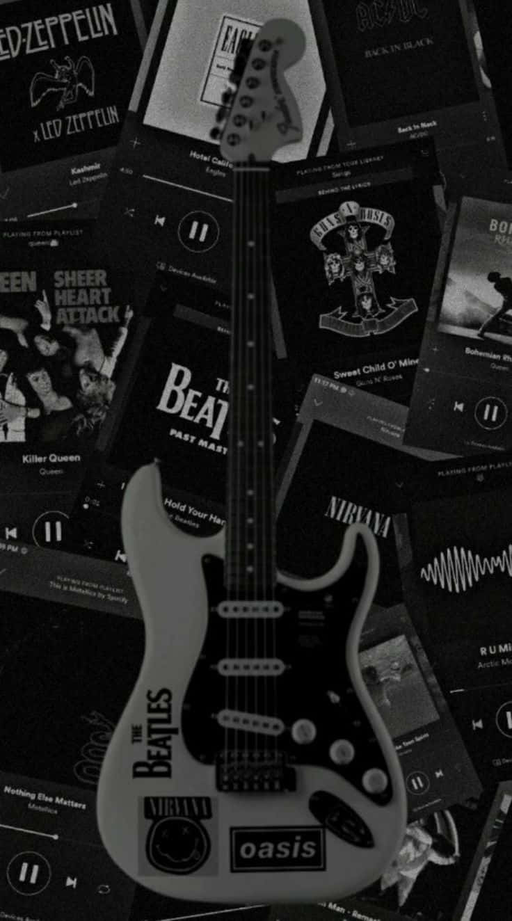 Electric Guitar Among Classic Albums Wallpaper