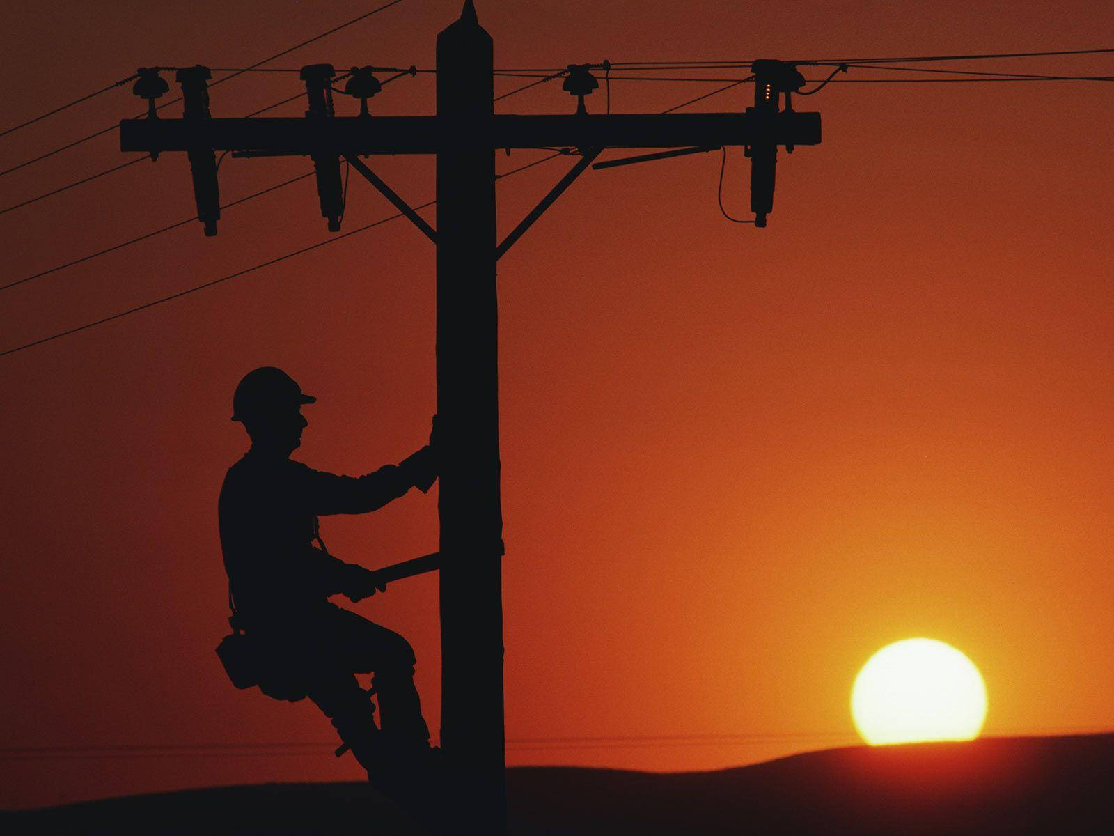 Electrician Climbing Post Wallpaper