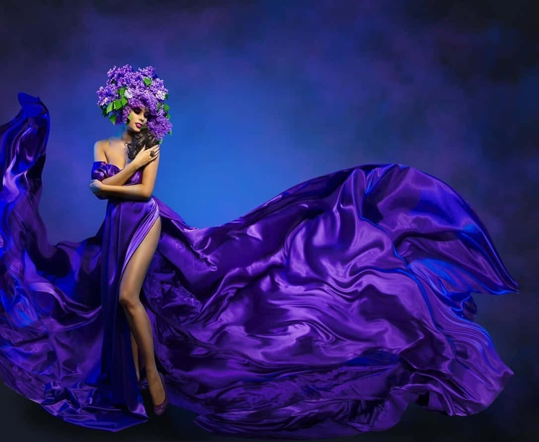 Elegant And Stylish In A Deep Purple Dress. Wallpaper