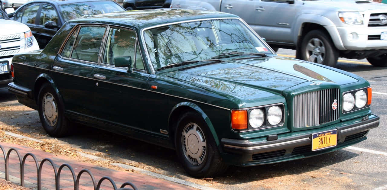 Elegant Bentley Turbo R In Dark Blue Wallpaper