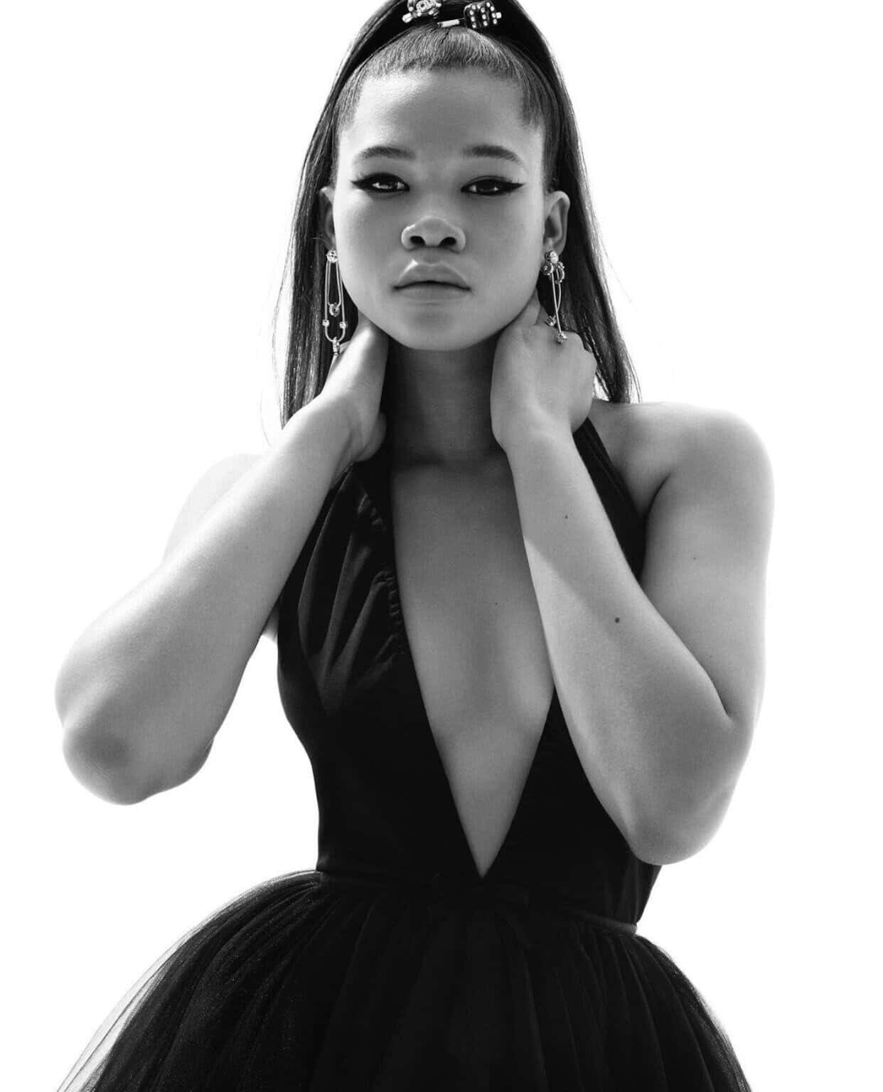 Elegant Blackand White Portraitof Storm Reid Wallpaper