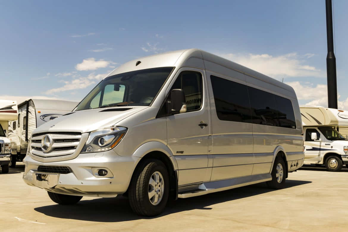 Elegant Mercedes Benz Sprinter In Action Wallpaper