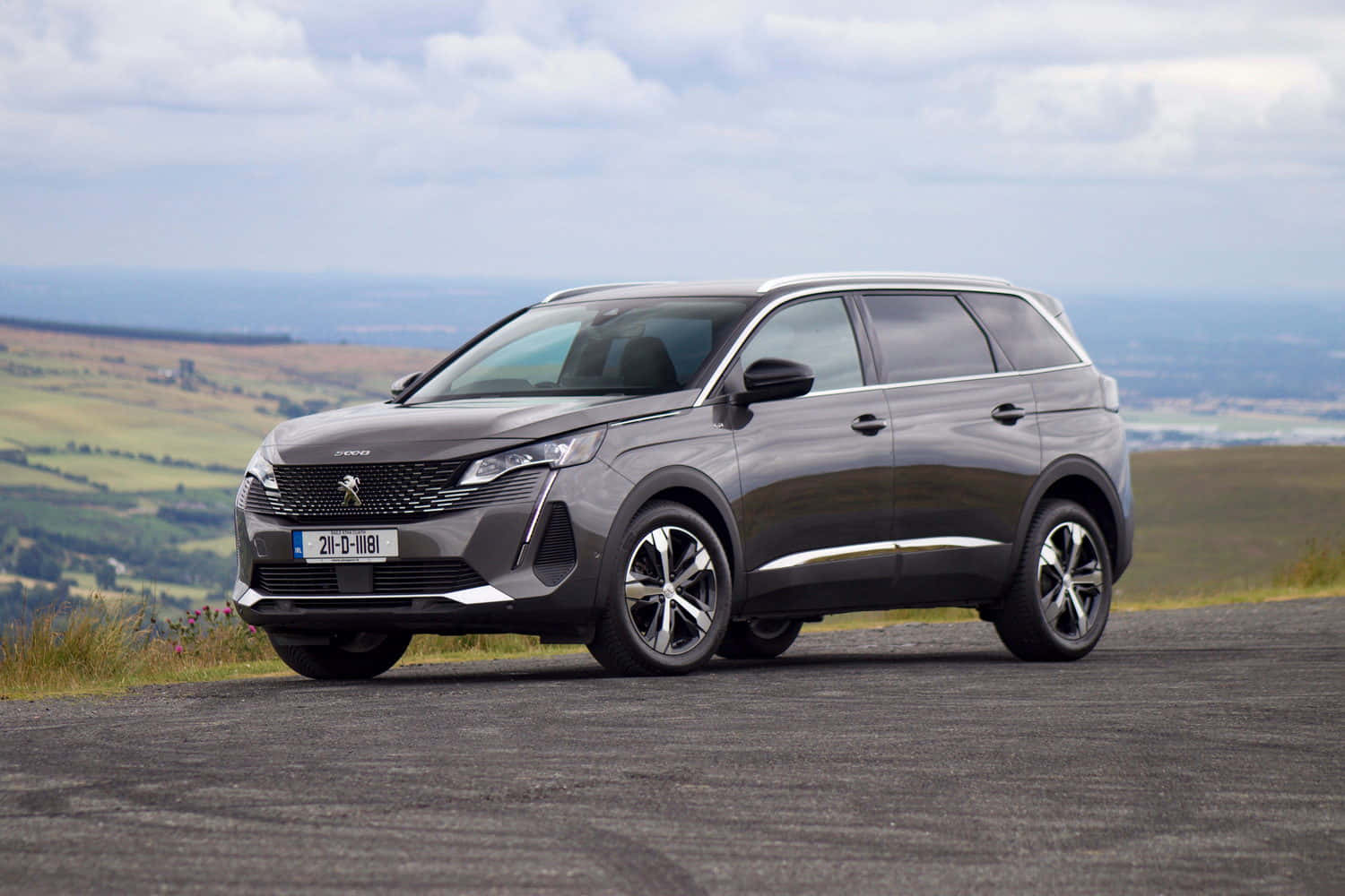 Elegant Peugeot 5008 Cruising On An Open Road Wallpaper