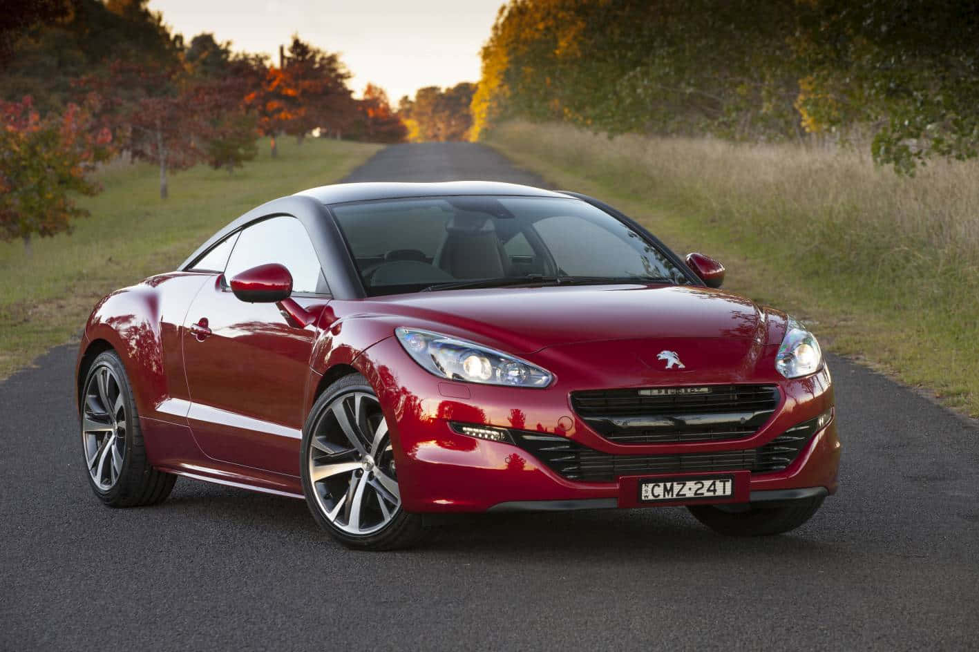 Elegant Peugeot Rcz In Motion Wallpaper