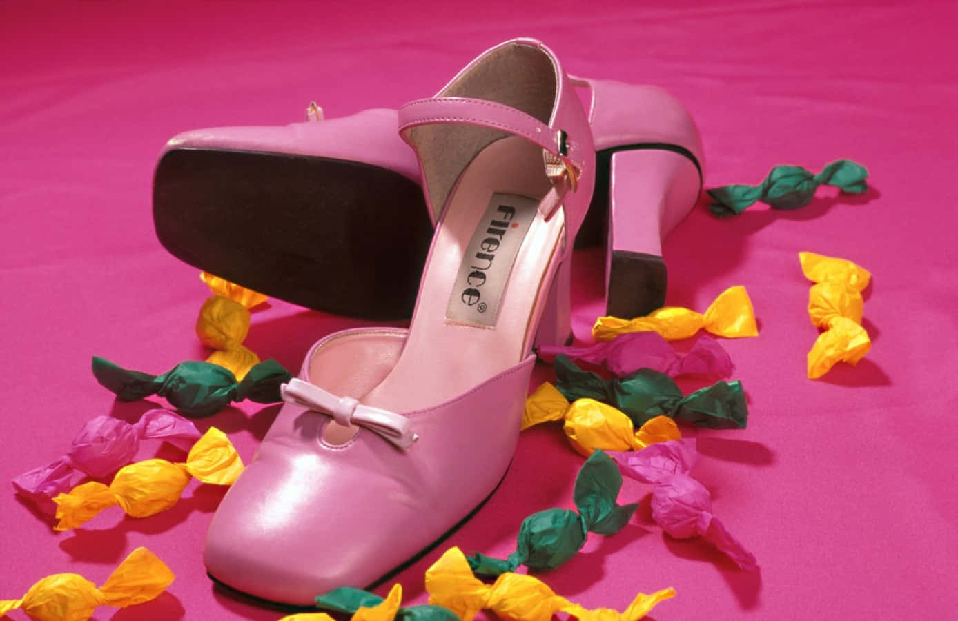 Elegant Pink Shoes On Display Wallpaper