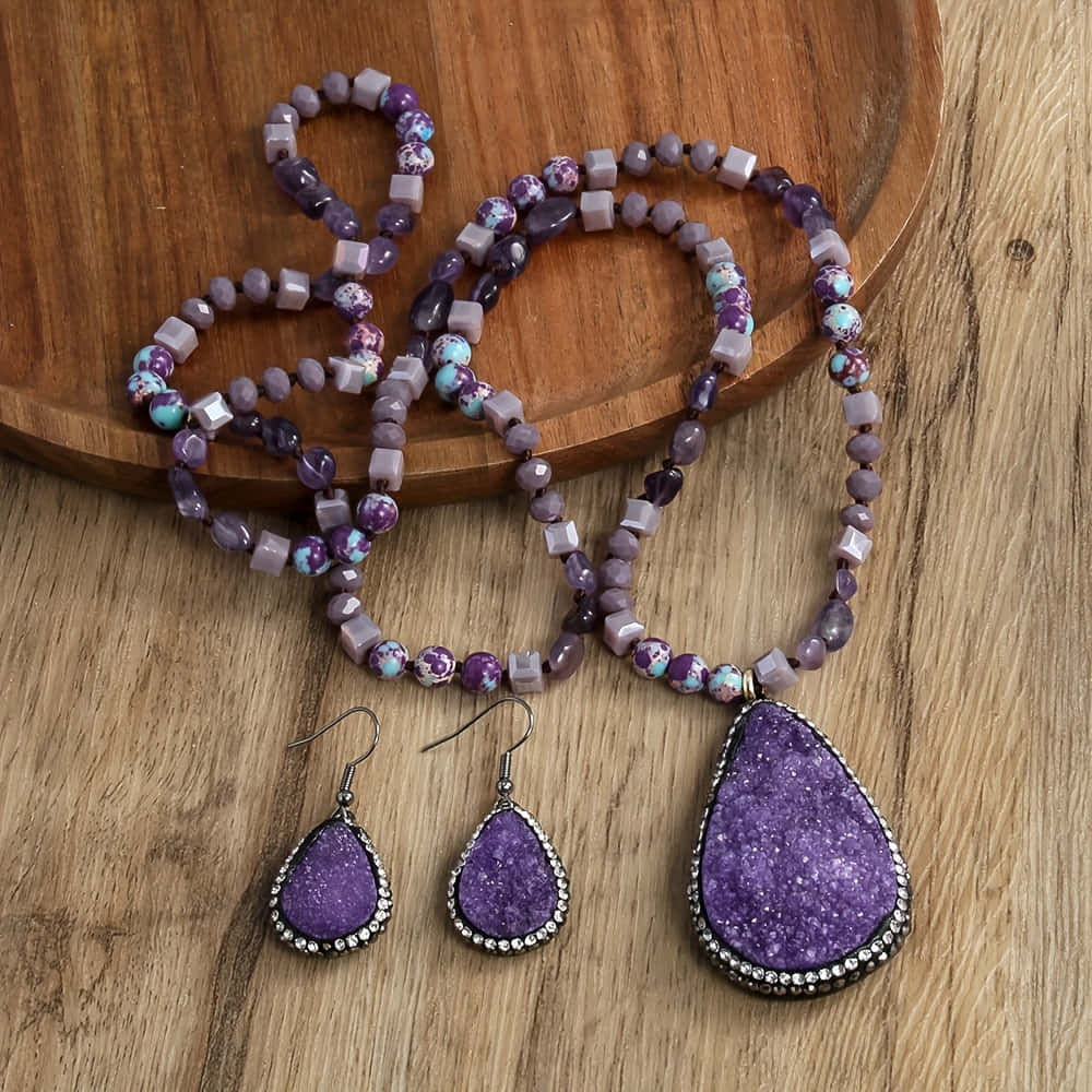 Elegant Purple Stone Jewelry Set Wallpaper