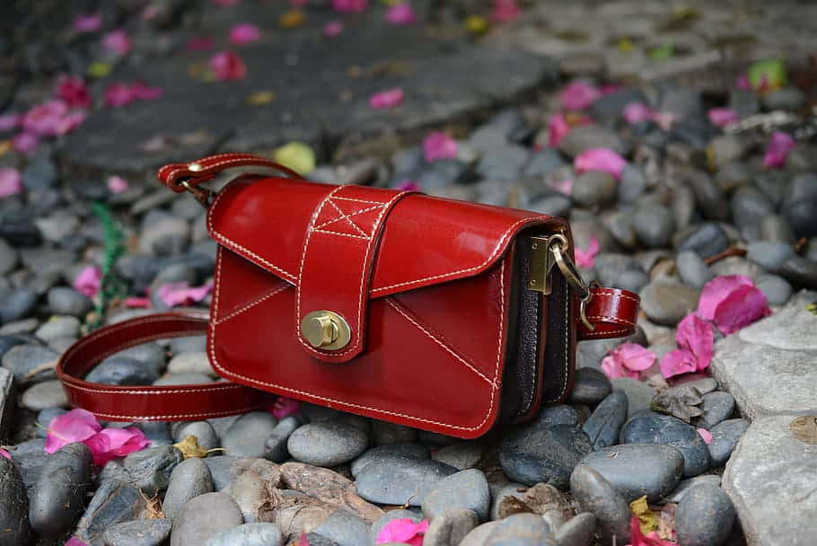 Elegant Red Handbag For A Stylish Look Wallpaper