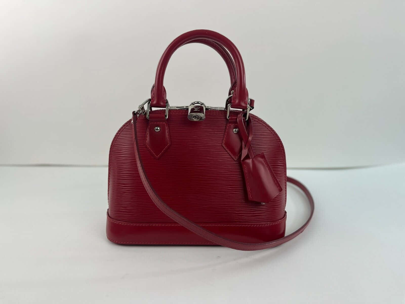 Elegant Red Handbag On A Black Background Wallpaper