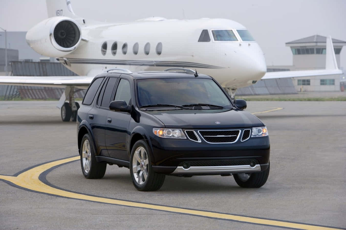 Elegant Saab 9-7x Traversing The Highway Wallpaper