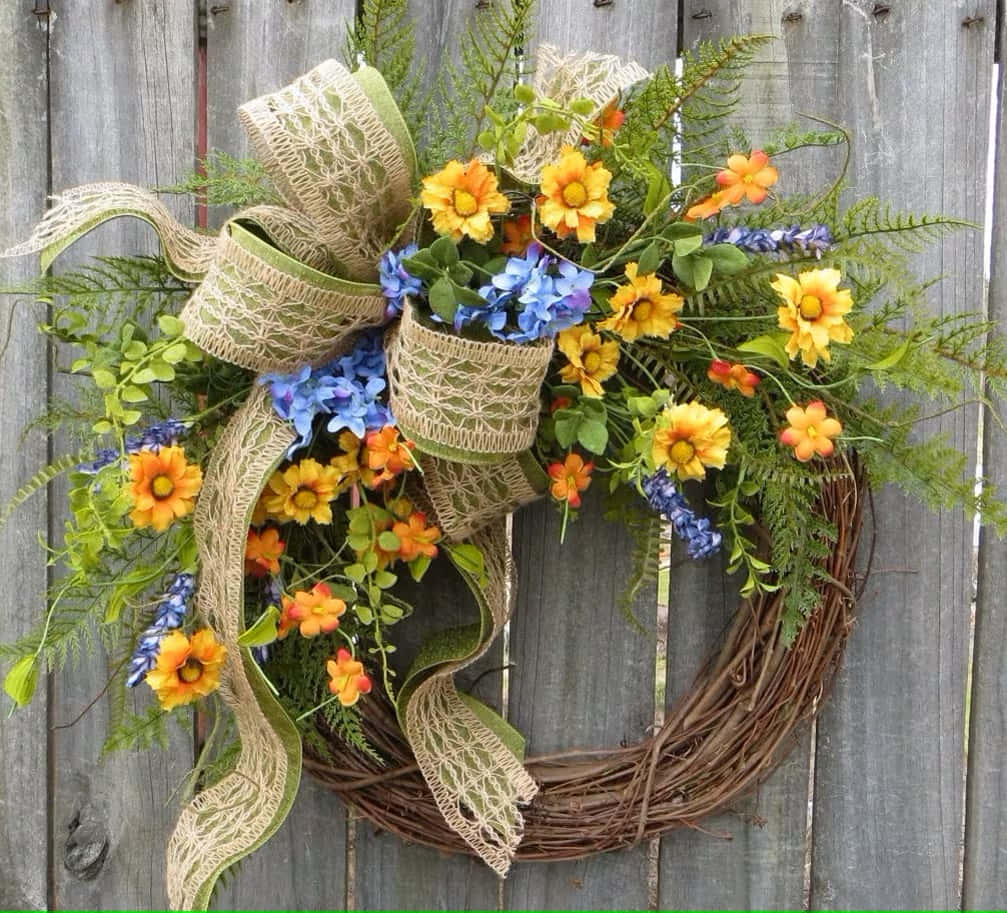 Elegant Spring Wreath On Rustic Wooden Door Wallpaper