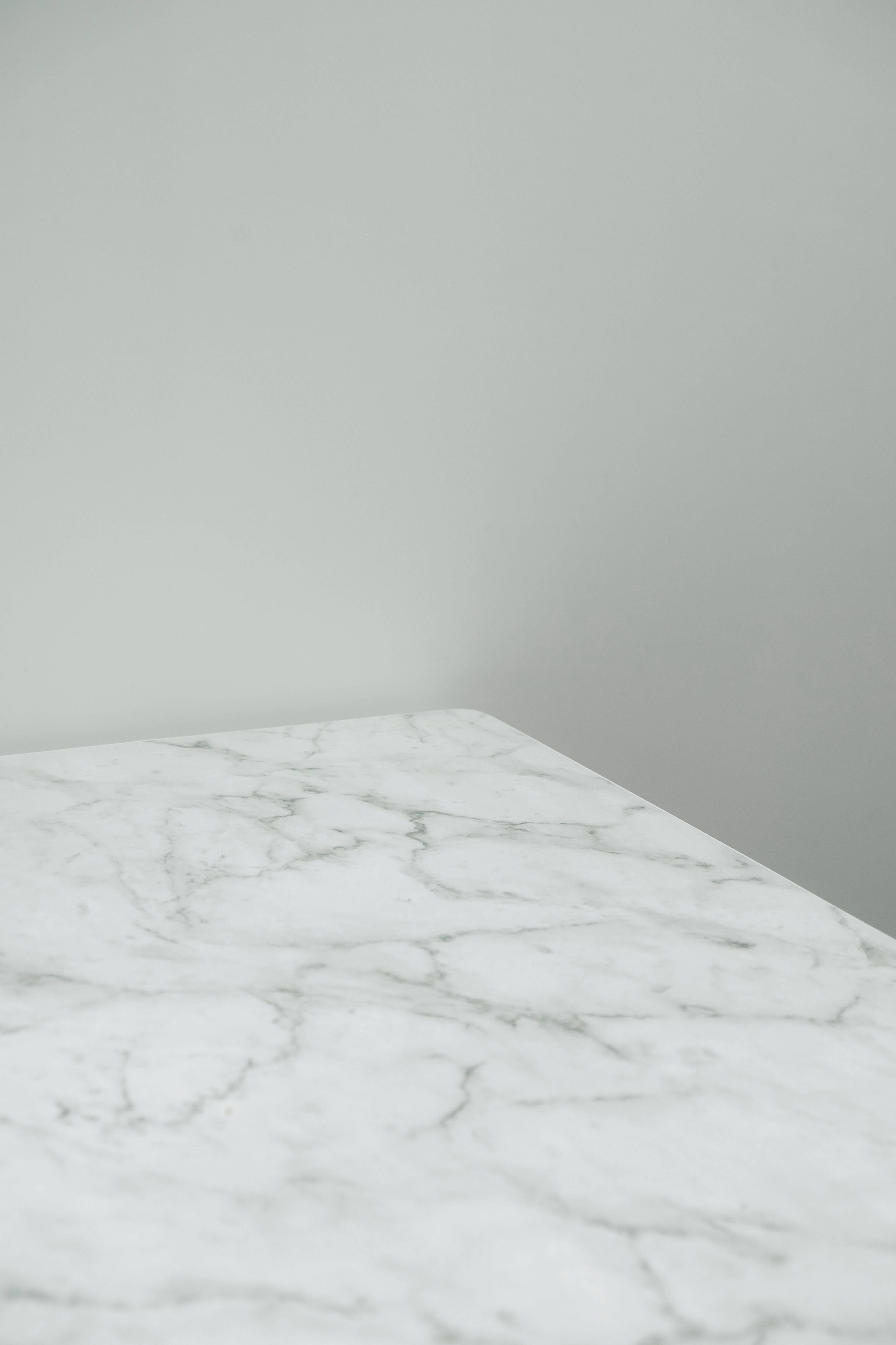 Elegant White Marble Countertop In A Modern Kitchen Wallpaper