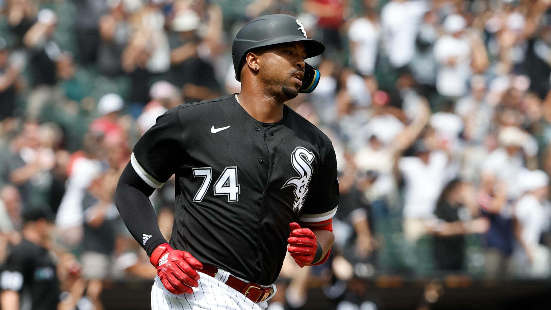 Eloy Jimenez In Action During A Baseball Game Wallpaper