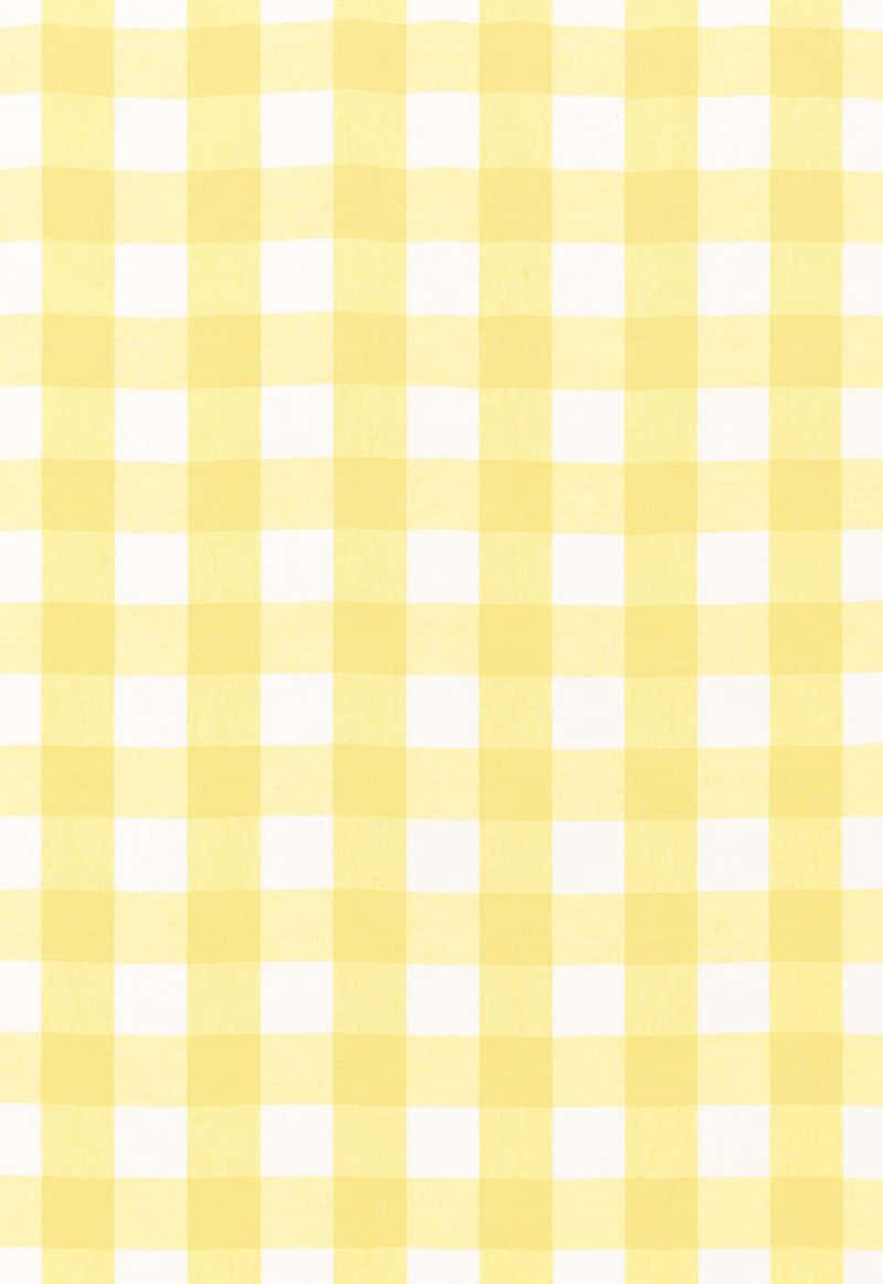 Embrace The Cheerful And Bold Energy Of Aesthetic Yellow Plaid Wallpaper