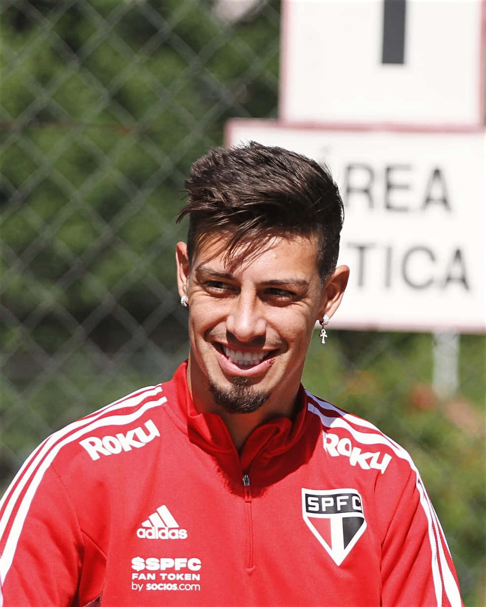 Emiliano Rigoni Smiling During Training Wallpaper